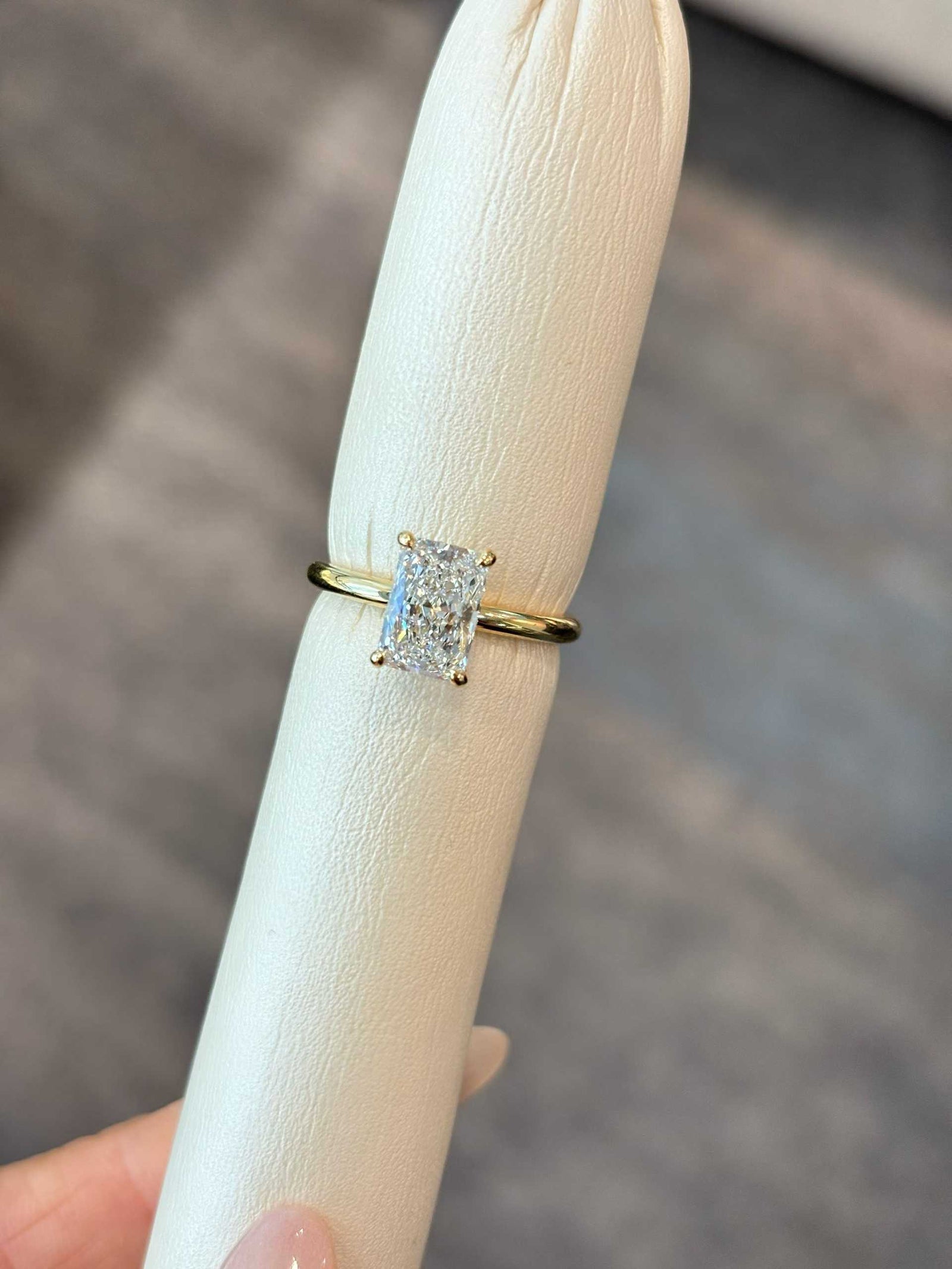 Radiant Four-Prong Solitaire Ring