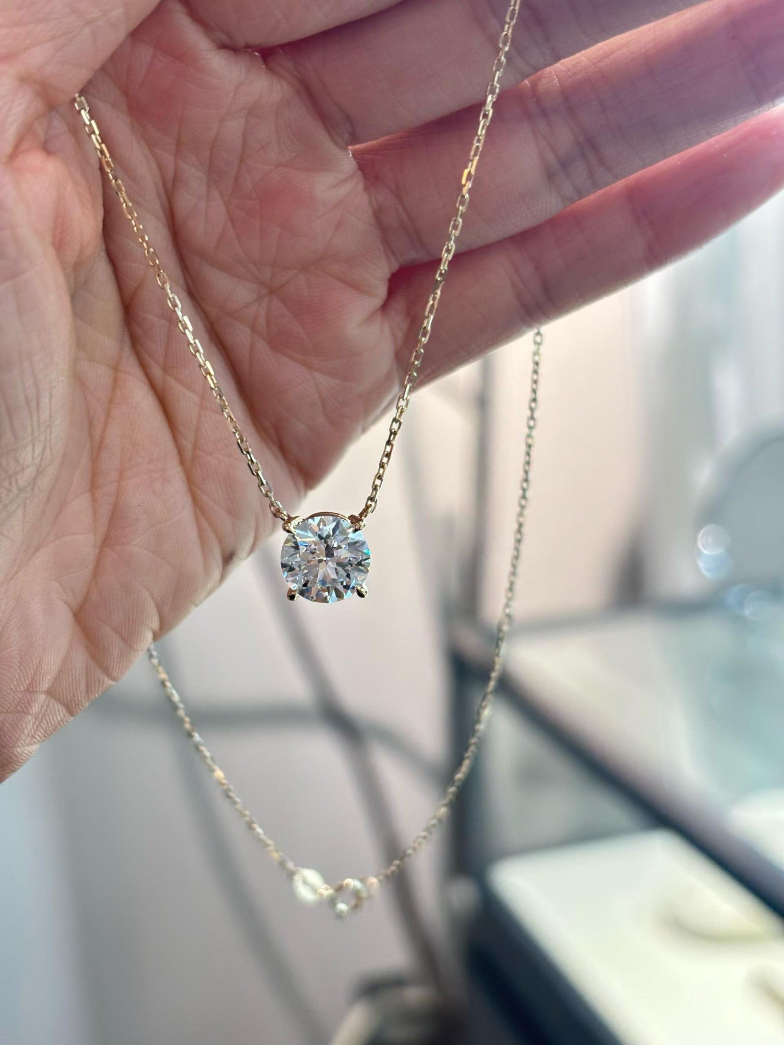 Round Solitaire Station Necklace